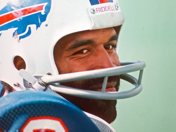 Simpson looks on from the sidelines of a Buffalo Bills game in 1975.