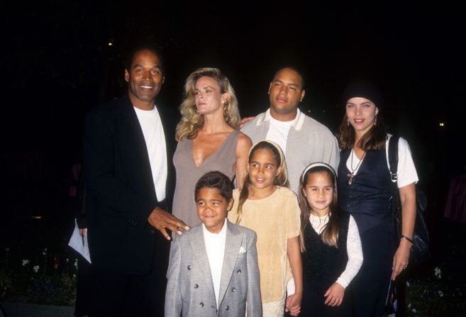 Simpson and his ex-wife Nicole pose for photos in 1994 with several of his children at the premiere of "Naked Gun 33 1/3: The Final Insult," in which Simpson starred.