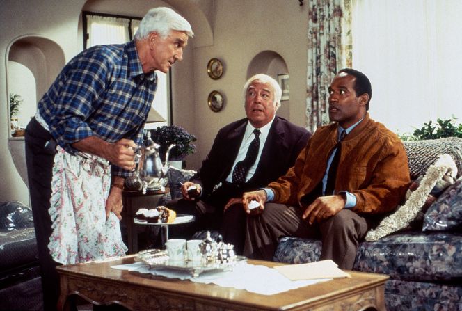 Simpson performs in a scene from "Naked Gun 33 1/3: The Final Insult" with Leslie Nielsen, left, and George Kennedy.