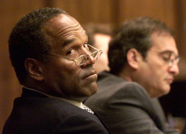 Simpson looks back into the courtroom gallery during the fourth day of jury selection in his road rage trial in Miami in October 2001. He was found not guilty.