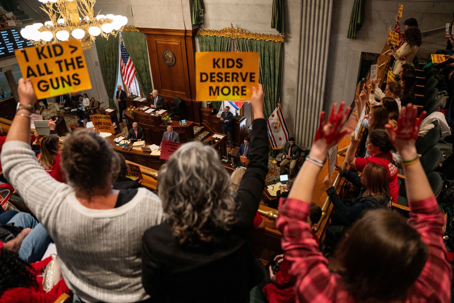 Gun reform activists gather in the gallery of the Tennessee state Senate in Nashville on Tuesday, April 9. The protesters came to <a href="index.php?page=&url=https%3A%2F%2Fwww.cnn.com%2F2024%2F04%2F10%2Fus%2Ftennessee-teachers-gun-carry-bill%2Findex.html" target="_blank">oppose a bill that would authorize teachers and staff in K-12 public schools to carry concealed handguns</a> on school grounds. The Senate passed <a href="index.php?page=&url=https%3A%2F%2Fwww.capitol.tn.gov%2FBills%2F113%2FBill%2FSB1325.pdf" target="_blank" target="_blank">SB 1325</a> in a 26-5 vote as the noisy, sign-waving opponents urged its demise and just over a year after a <a href="index.php?page=&url=https%3A%2F%2Fwww.cnn.com%2Finteractive%2F2023%2F03%2Fus%2Ftimeline-covenant-school-shooting-nashville%2F" target="_blank">fatal shooting at a private Christian school</a> in Nashville where <a href="index.php?page=&url=https%3A%2F%2Fwww.cnn.com%2F2024%2F03%2F27%2Fus%2Ftennessee-school-shooting-human-chain%2Findex.html" target="_blank">three 9-year-olds and three adults</a> were killed. The measure would require approval by the state House before moving to the desk of Republican Gov. Bill Lee, whose office did not immediately respond to CNN's request for comment. 