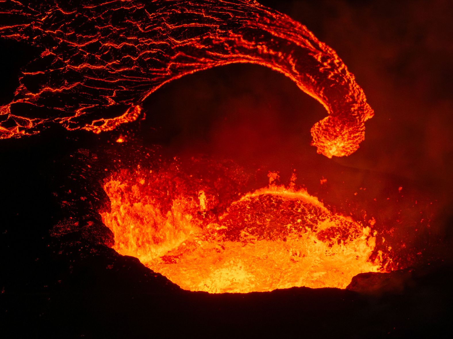 Lava emerges from a volcano near Grindavik, Iceland, on Saturday, April 6.