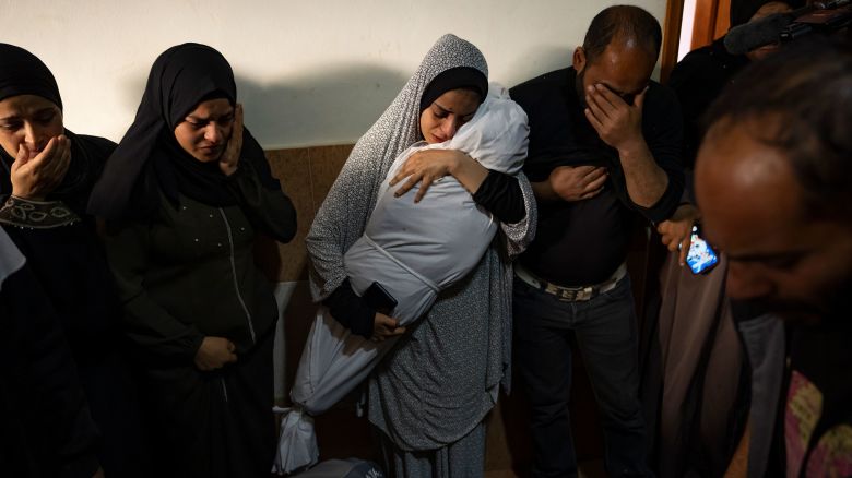 Members of the Abu Draz family mourn their relatives killed in the Israeli bombardment of the Gaza Strip, at their house in Rafah, southern Gaza, Thursday, April 4, 2024. (AP Photo/Fatima Shbair)