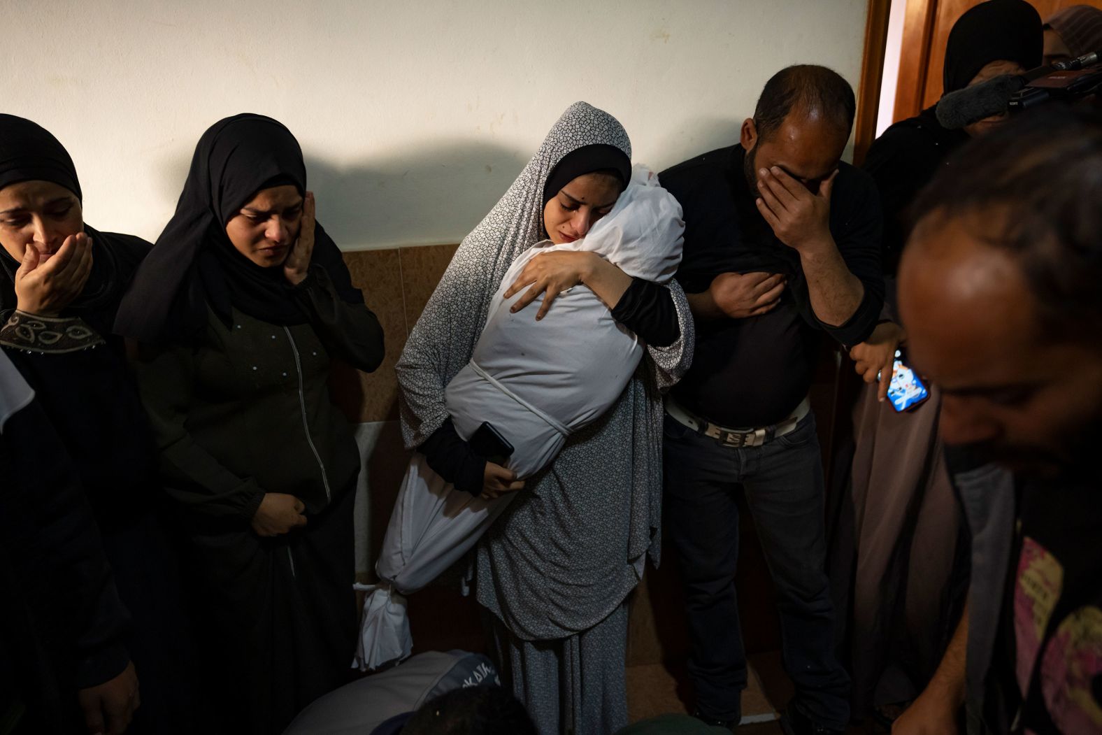 Members of the Abu Draz family mourn relatives killed amid Israel's bombardment of Gaza at their house in Rafah, Gaza, on Thursday, April 4.
