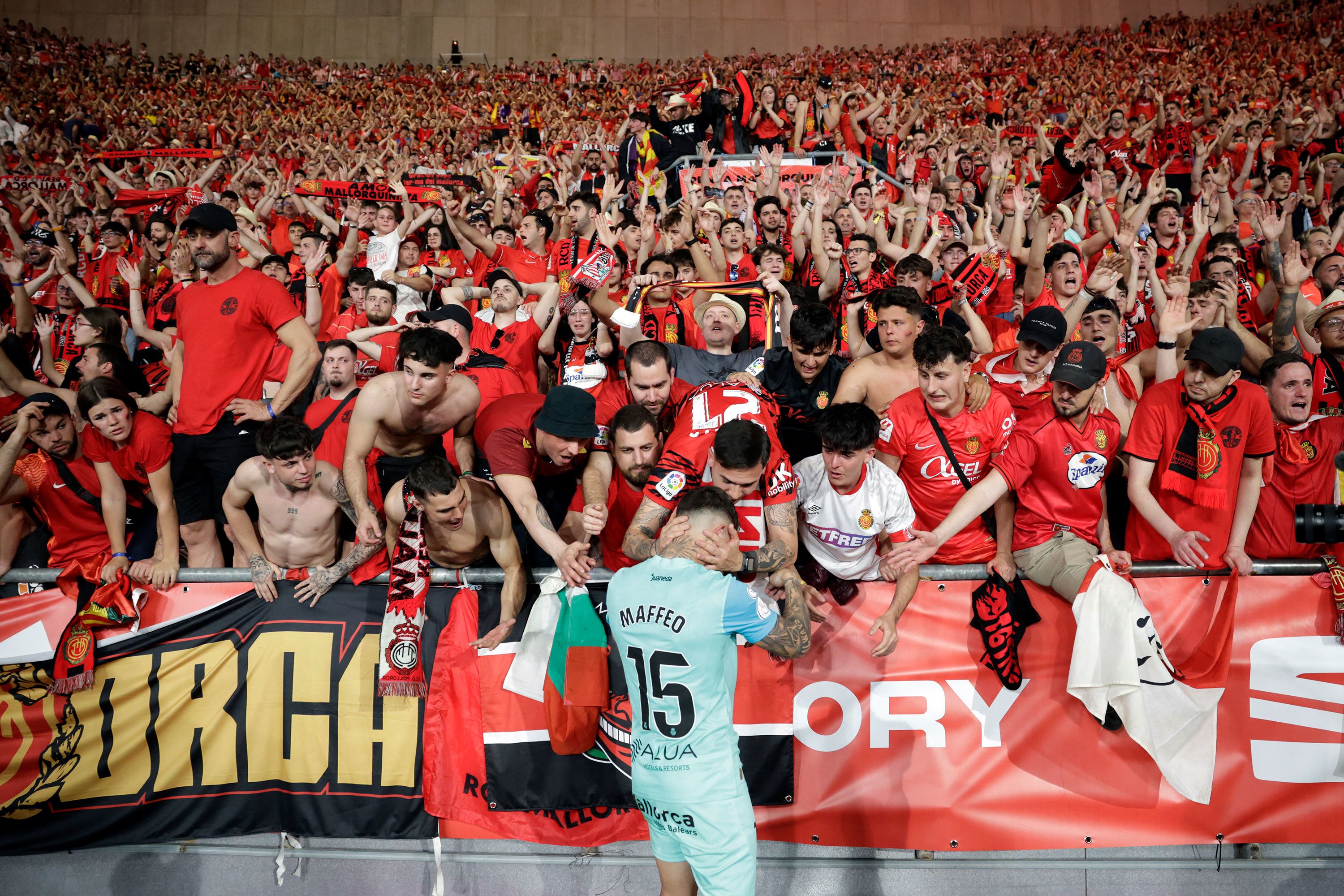 Fans comfort Real Mallorca defender Pablo Maffeo at the end of the Spanish Copa del Rey final football match between Athletic Club Bilbao and Real Mallorca in Seville, Spain, on Saturday, April 6.