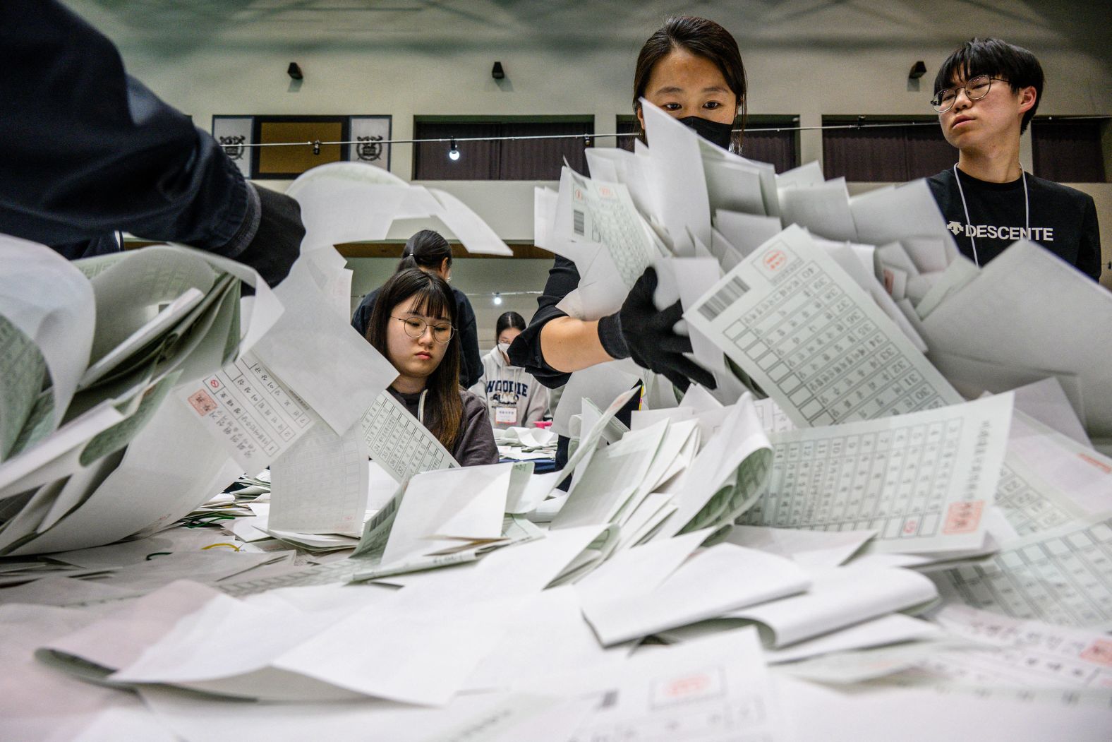 Election officials sort through ballots at a counting station in Seoul, South Korea, after voting closed on Wednesday, April 10. South Korea's liberal opposition parties <a href="index.php?page=&url=https%3A%2F%2Fwww.cnn.com%2F2024%2F04%2F10%2Fasia%2Fsouth-korea-midterm-election-intl-hnk%2Findex.html" target="_blank">scored a landslide victory</a> in the parliamentary election.
