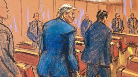 In this court sketch, former US President Donald Trump enters the courtroom with his attorney Todd Blanche at the beginning of Monday's trial at Manhattan Criminal Court in New York.