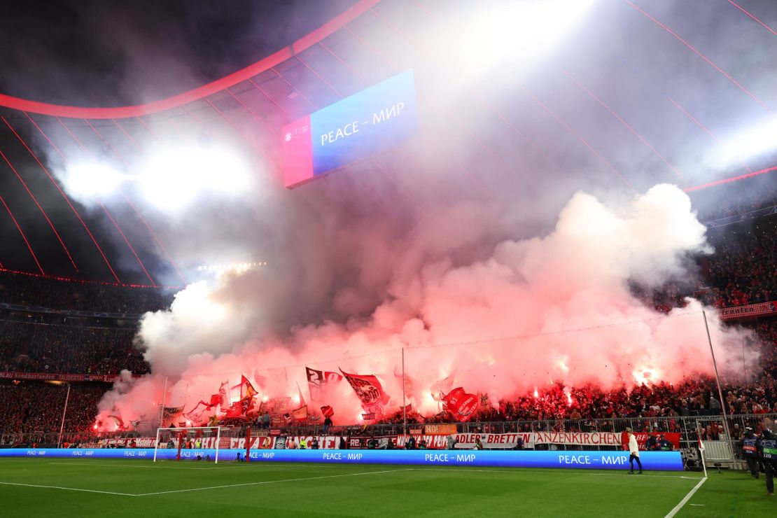 MUNICH, GERMANY - APRIL 17: Bayern Munich fans show their support with flares prior to the UEFA Champions League quarter-final second leg match between FC Bayern München and Arsenal FC at Allianz Arena on April 17, 2024 in Munich, Germany. (Photo by Alexander Hassenstein/Getty Images)