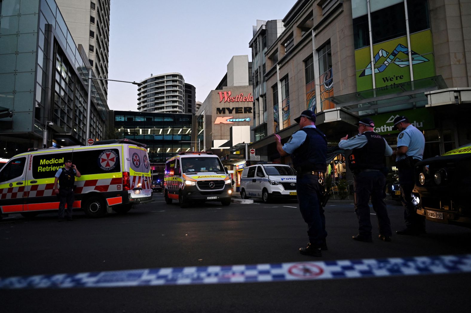 Emergency service workers on the scene after six people were killed and several injured in a <a href="index.php?page=&url=https%3A%2F%2Fwww.cnn.com%2Faustralia%2Flive-news%2Fsydney-mall-attack-updates-intl%2Findex.html" target="_blank">mass stabbing</a> at the Westfield Bondi Junction shopping mall in Sydney, Australia, on Saturday, April 13.