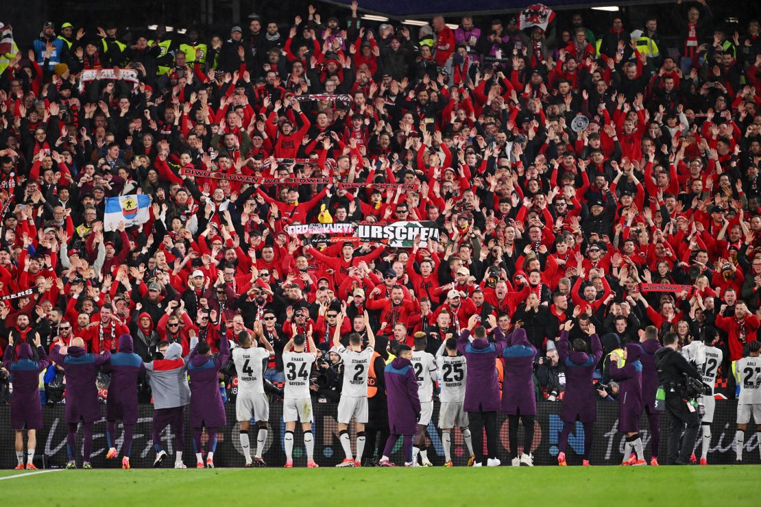 LONDON, ENGLAND - APRIL 18: Fans of Bayer Leverkusen celebrate with the players at full-time following the side's qualification to the semi-final stage in the UEFA Europa League after the UEFA Europa League 2023/24 Quarter-Final second leg match between West Ham United FC and Bayer 04 Leverkusen at Olympic Stadium on April 18, 2024 in London, England. (Photo by Mike Hewitt/Getty Images)