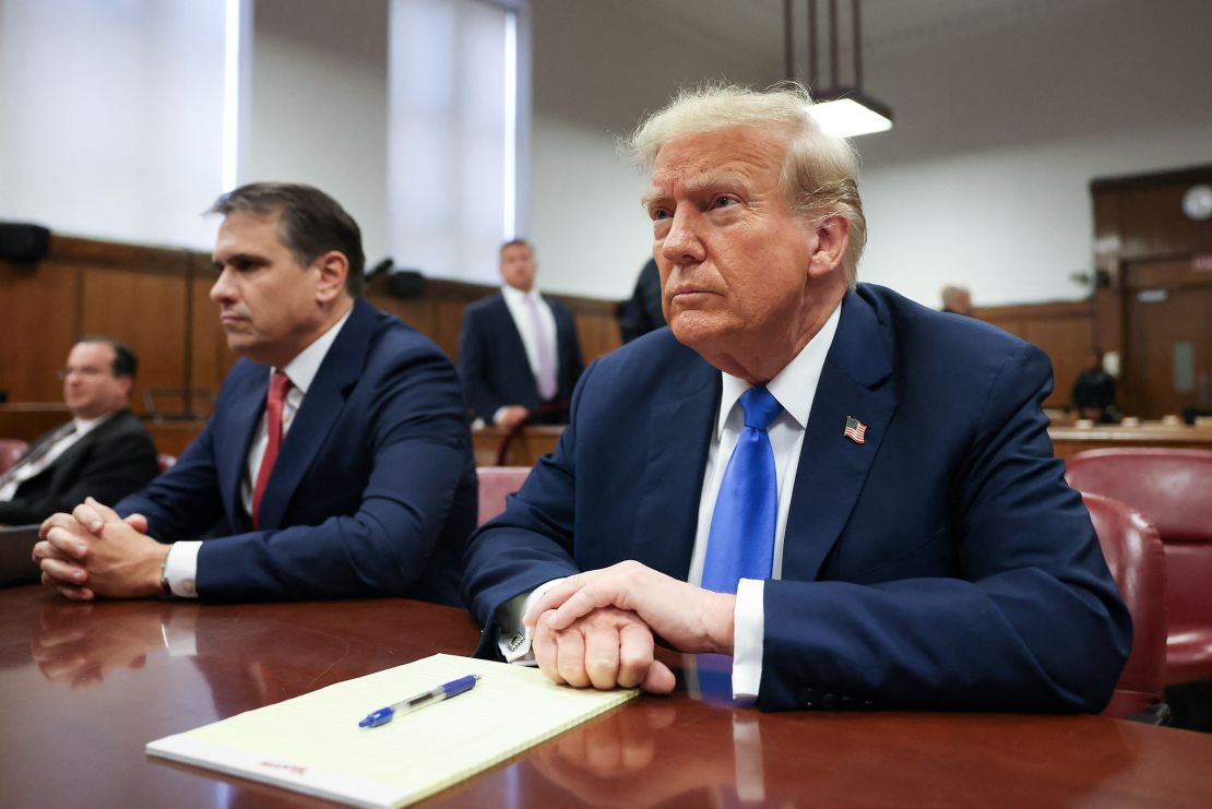 Former President Donald Trump looks on at Manhattan Criminal Court during his trial for allegedly covering up hush money payments linked to extramarital affairs in New York on April 22.