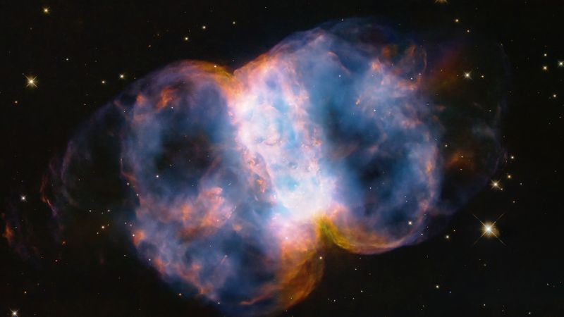 Hubble image may contain evidence of stellar cannibalism in a dumbbell-shaped nebula