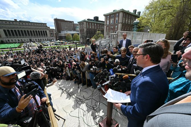 House Speaker Mike Johnson speaks to the media on the campus of Columbia University after meeting with Jewish students on April 24. He called on the school's president to resign during a <a href=