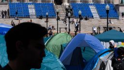 Tents set up by demonstrators are seen on the Columbia campus against the backdrop of the university's preparation for graduation ceremonies on April 24, 2024 in New York City. School administrators and pro-Palestinian, student protesters made progress on negations after the school set a midnight deadline for students to disband their encampment as tensions remained high on the campus.