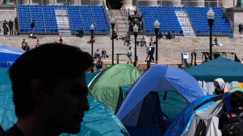 Tents set up by demonstrators are seen on the Columbia campus against the backdrop of the university's preparation for graduation ceremonies on April 24, 2024 in New York City. School administrators and pro-Palestinian, student protesters made progress on negations after the school set a midnight deadline for students to disband their encampment as tensions remained high on the campus.