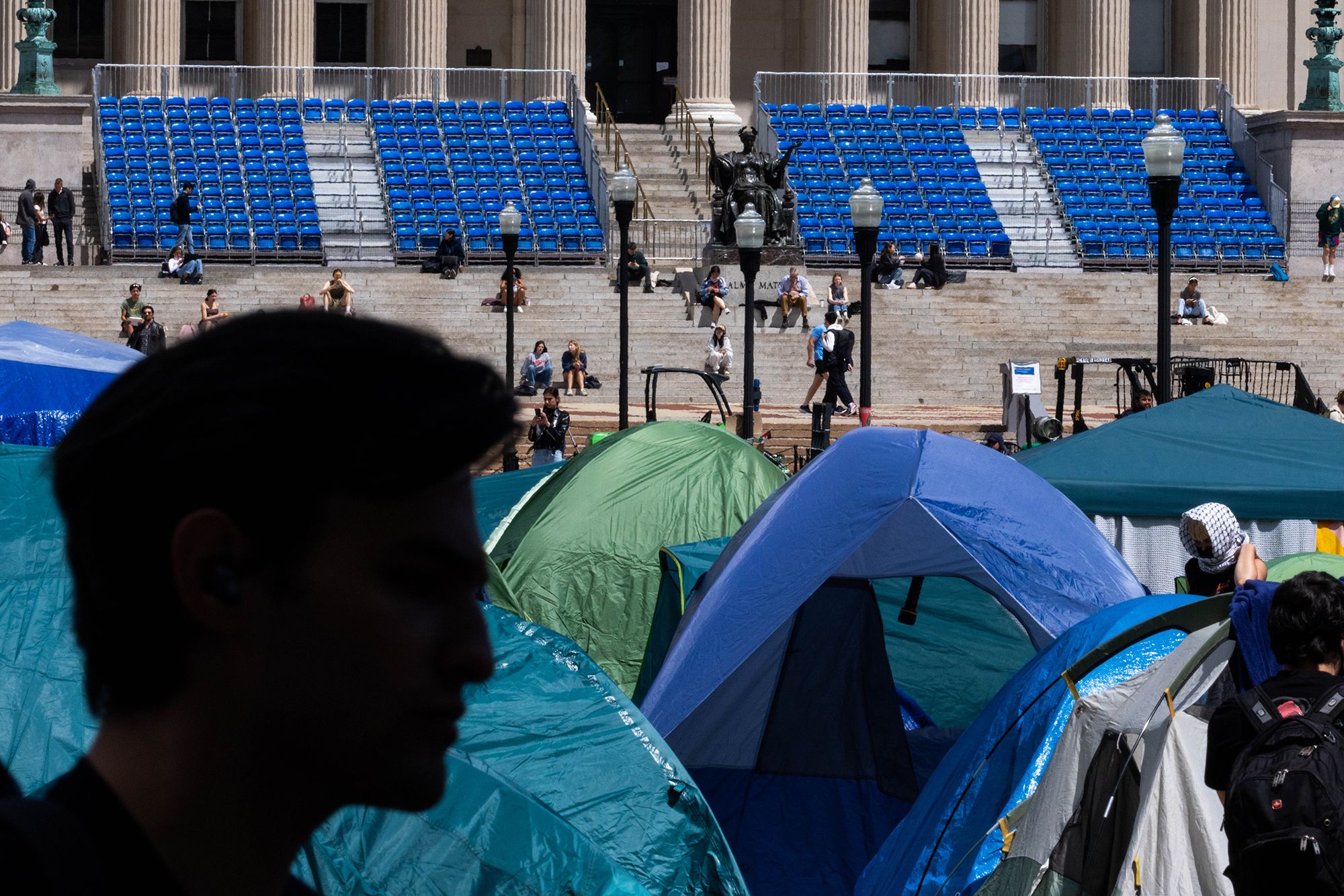 Demonstrators' tents are set up on Columbia's campus in New York on April 24. The school is also preparing for graduation ceremonies.