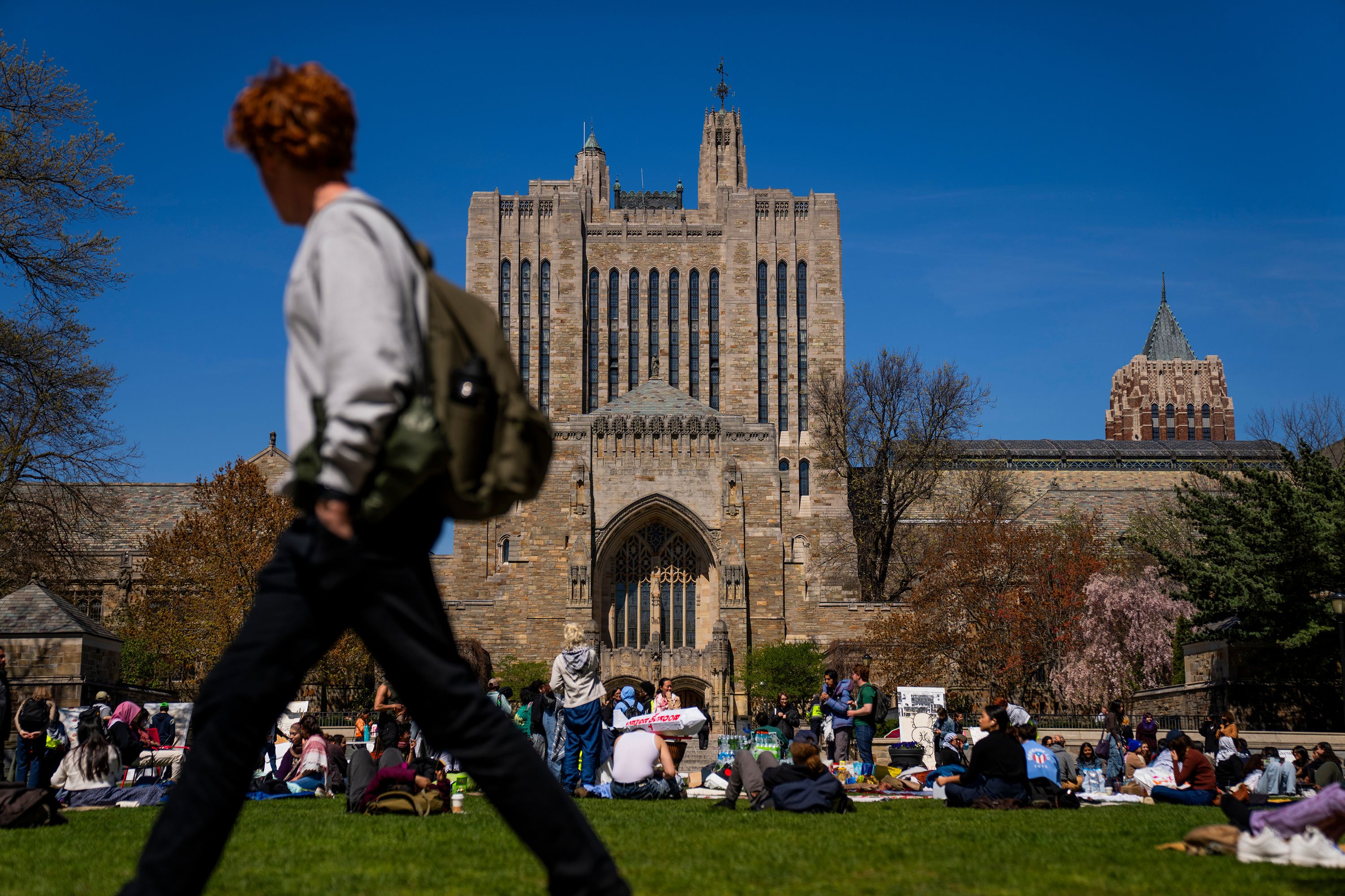 Pro-Palestinian demonstrators sit at Yale University in New Haven, Connecticut, on April 23. University police <a href=
