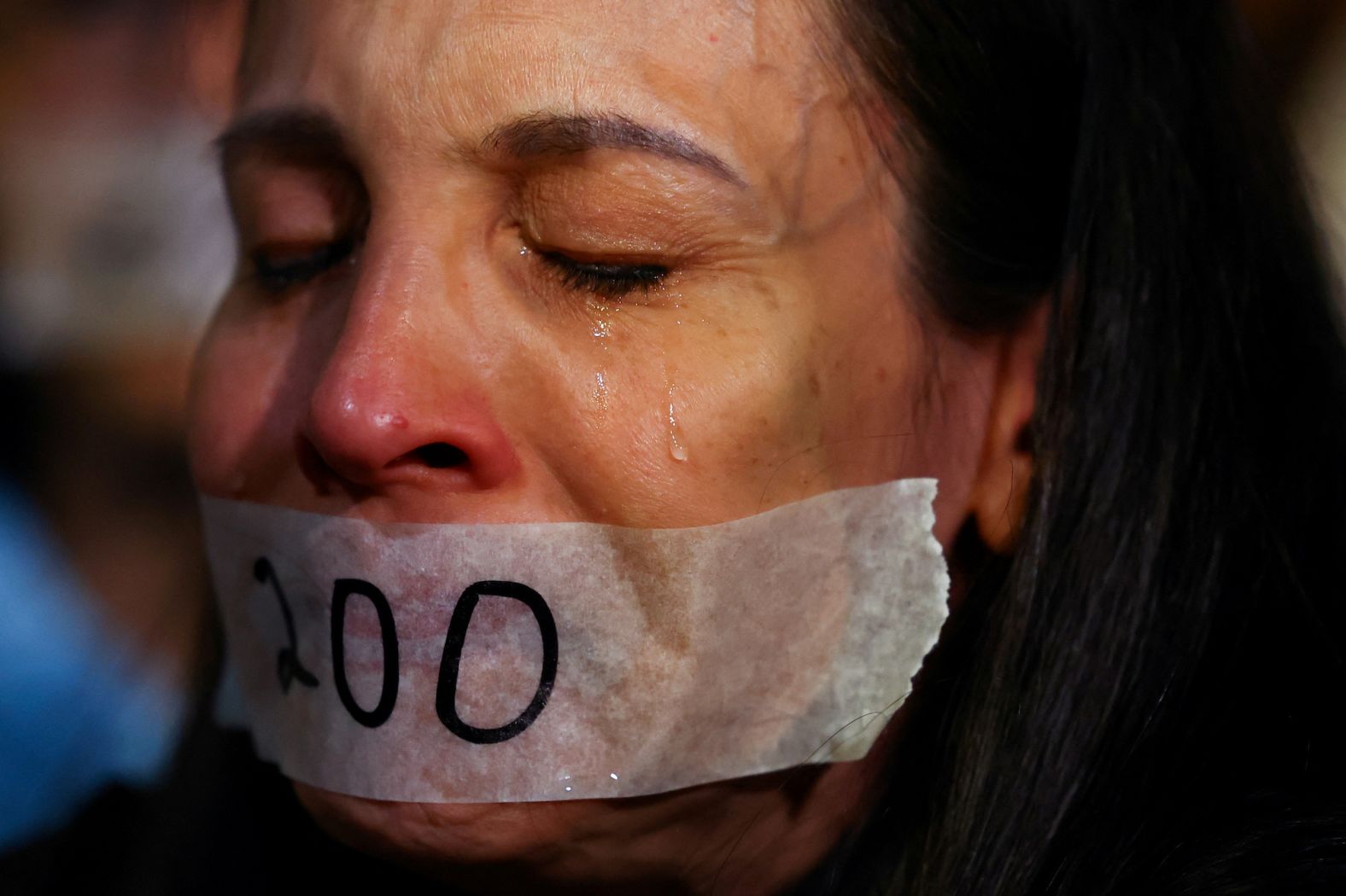 A woman in Tel Aviv, Israel, reacts during a protest marking 200 days since the start of the conflict between Israel and Hamas on Tuesday, April 23.