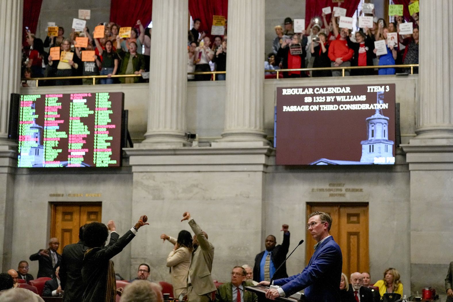 Tennessee state Rep. Ryan Williams, right, watches from the House floor in Nashville on Tuesday, April 23, as legislators passed <a href="index.php?page=&url=https%3A%2F%2Fwww.cnn.com%2F2024%2F04%2F23%2Fus%2Ftennessee-teachers-gun-carry-bill%2Findex.html" target="_blank">a bill that would allow teachers and school staff to be armed</a>.