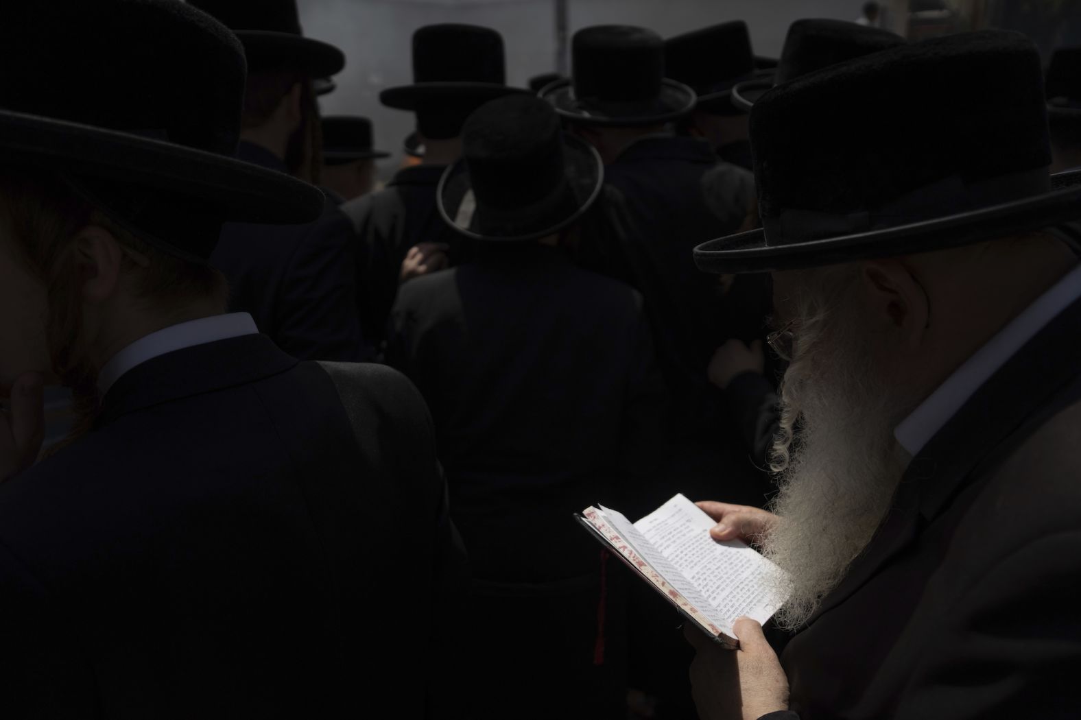 Ultra-Orthodox Jewish men and children burn leavened items in final preparation for the Passover holiday in Bnei Brak, Israel, on Monday, April 22.