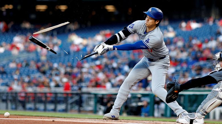 Apr 23, 2024; Washington, District of Columbia, USA; Los Angeles Dodgers designated hitter Shohei Ohtani (17) shatters his bat while hitting a ground ball against the Washington Nationals during the first inning at Nationals Park. Mandatory Credit: Geoff Burke-USA TODAY Sports     TPX IMAGES OF THE DAY