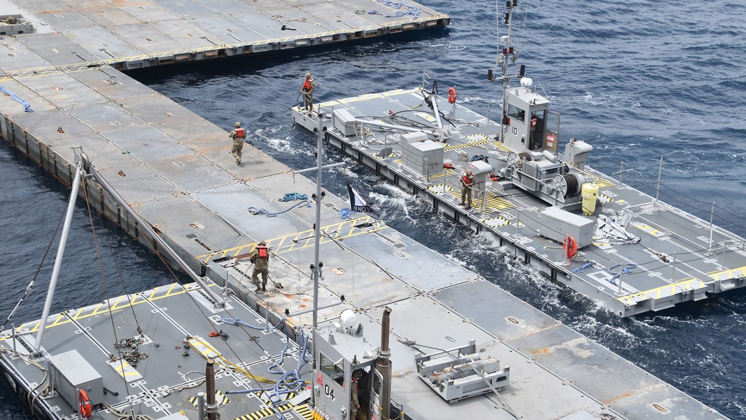 Construction of a temporary floating pier off the coast of Gaza to help deliver aid to the strip is seen in this photo posted on social media by US Central Command on April 30, 2024.