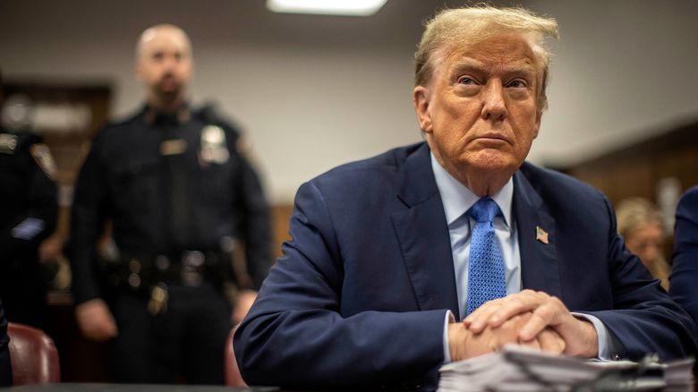 Former US President Donald Trump attends his trial for allegedly covering up hush money payments linked to extramarital affairs, at Manhattan Criminal Court in New York City on April 26, 2024.