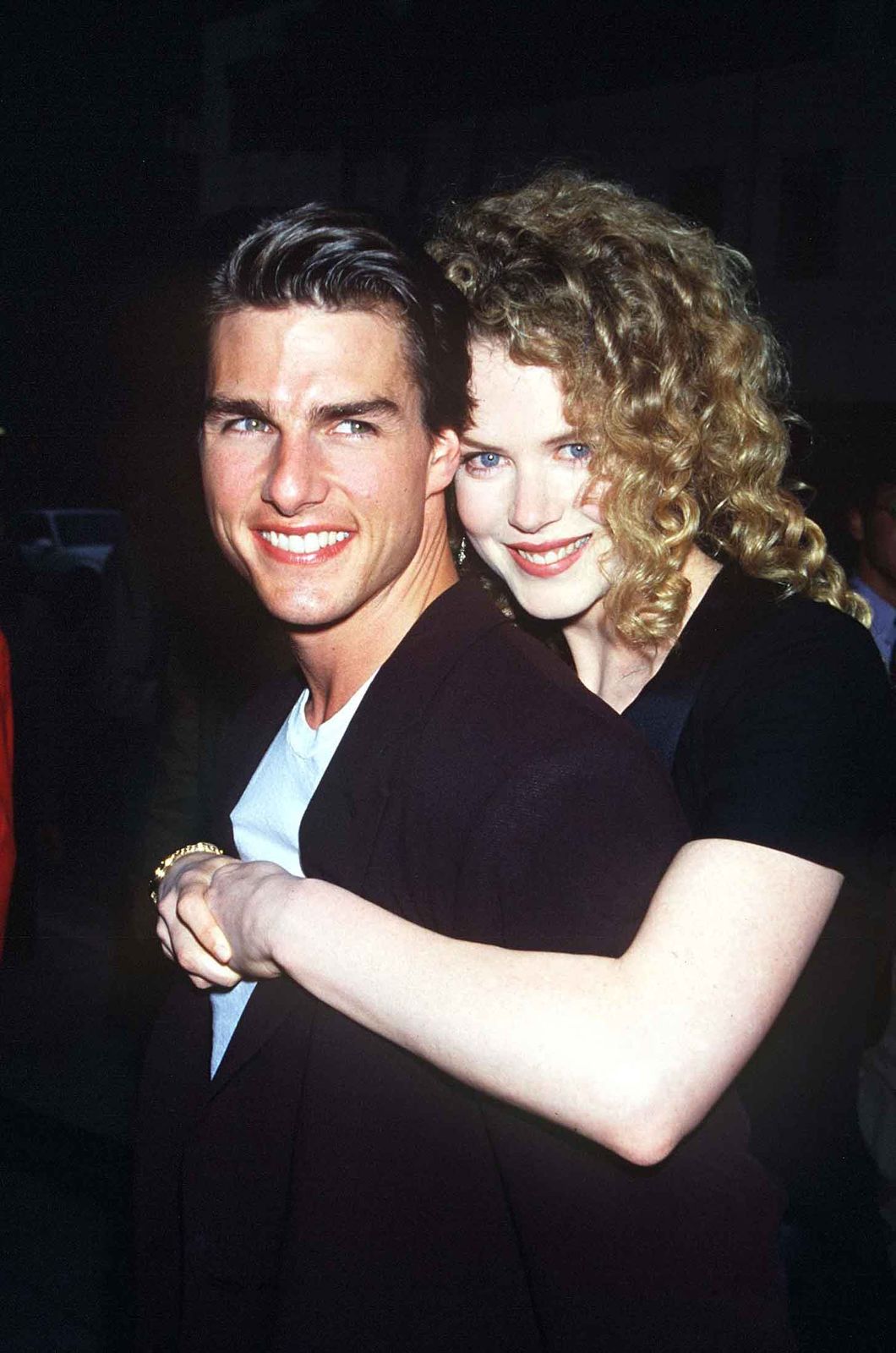 Kidman embraces her first husband, actor Tom Cruise, in 1992.