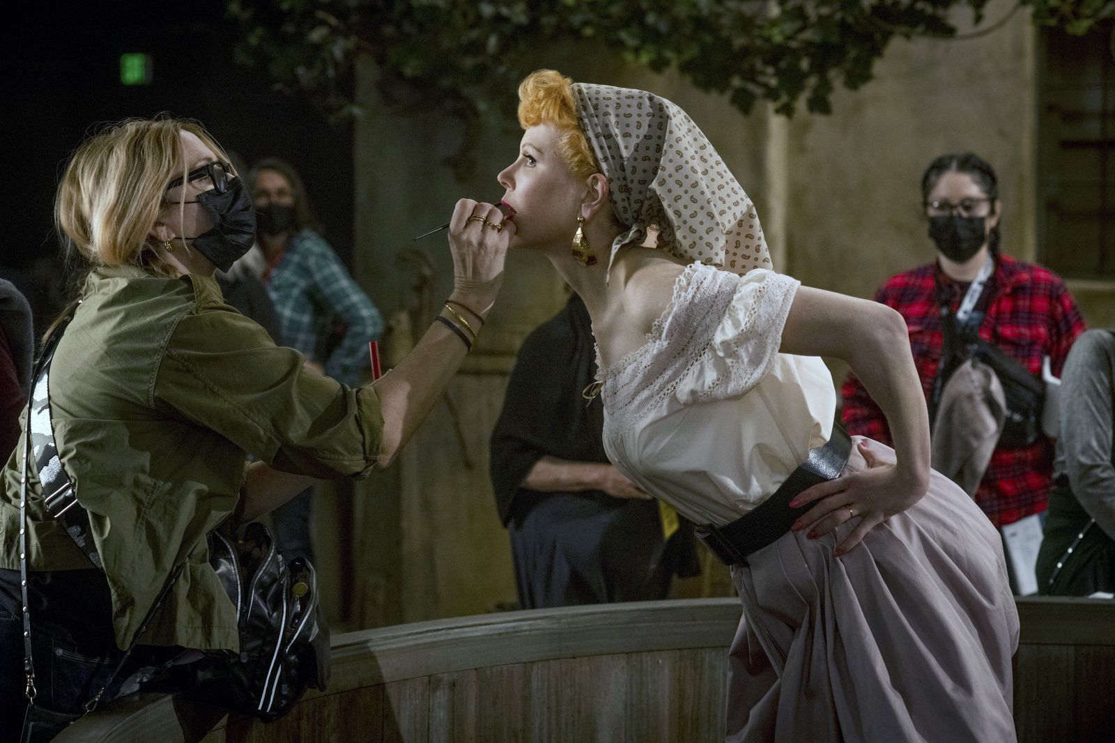 Kidman, starring as Lucille Ball, has makeup touched up on the set of 2021's 'Being the Ricardos.'