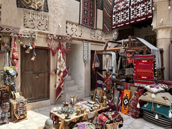 Next to Al Shindagha, Al Fahidi Historical Neighborhood was built in the early 1900s by Iranian traders. The area is now home to cafes and stores featuring traditional craftsmanship, like this textile and carpet shop, Suadna.  