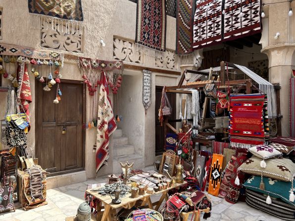 Next to Al Shindagha, Al Fahidi Historical Neighborhood was built in the early 1900s by Iranian traders. The area is now home to cafes and stores featuring traditional craftsmanship, like this textile and carpet shop, Suadna.