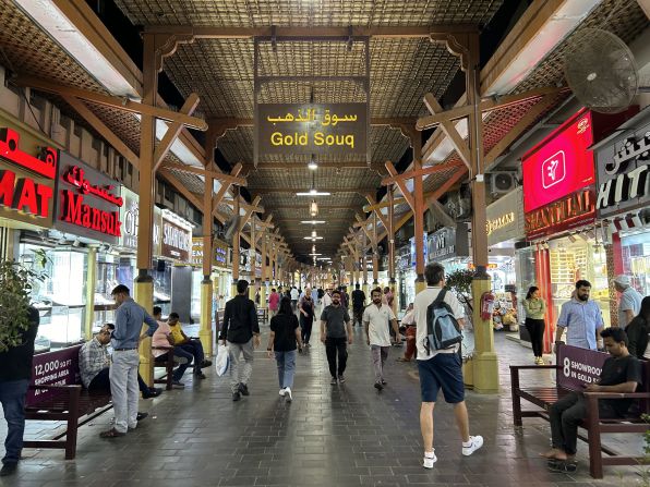 In the Gold Souk, admire the thousands of glinting goods on display, including the world's heaviest gold ring, a 58.6-kilogram 21-karat gold band as wide as a torso, set with 5.17 kilograms of precious stones.