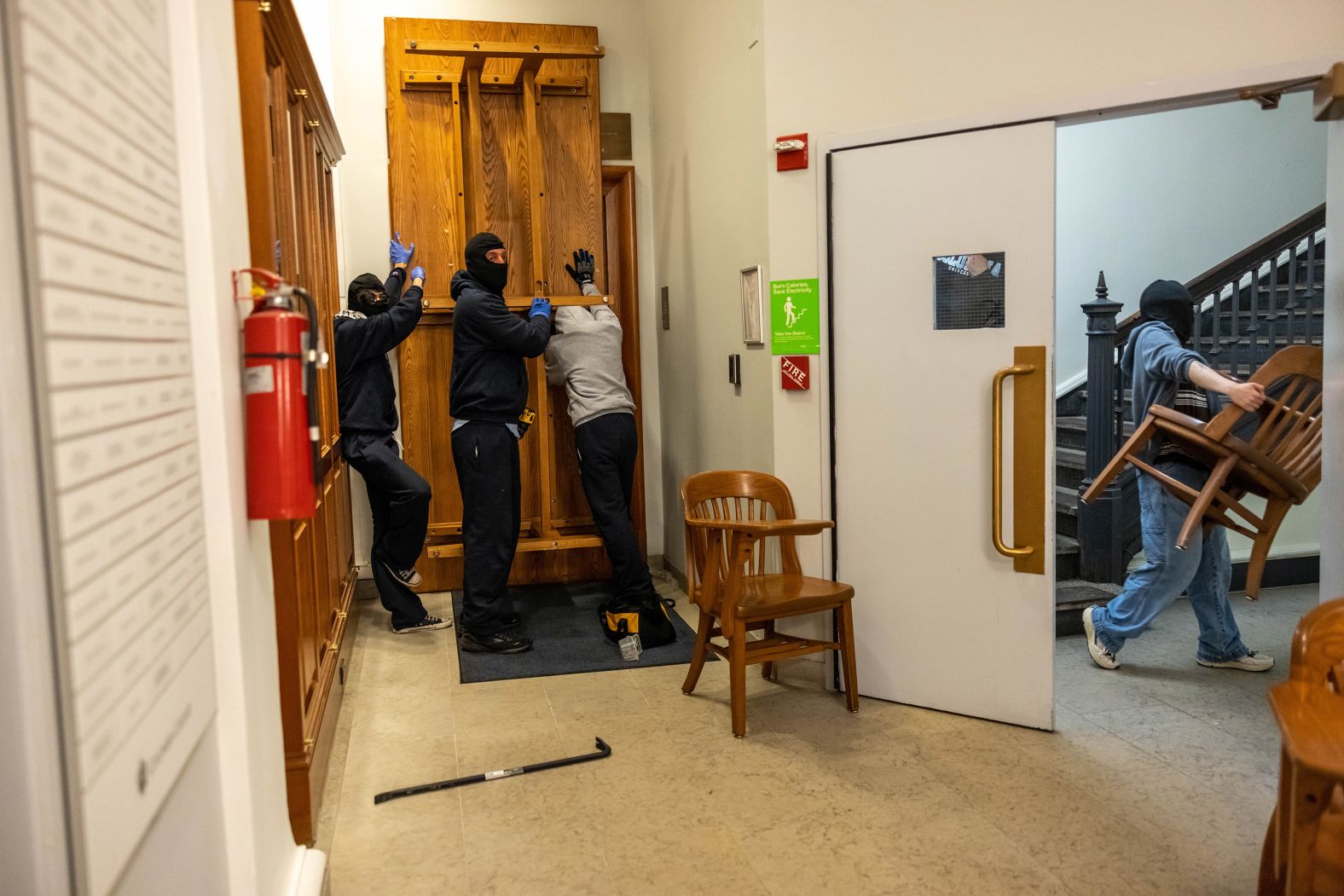 Protesters barricade themselves inside Hamilton Hall on April 30. Dozens of protesters <a href="index.php?page=&url=https%3A%2F%2Fwww.cnn.com%2Fbusiness%2Flive-news%2Funiversity-protests-palestine-04-30-24%2Fh_fb8bccd7910bc13983ddf382db0afd50" target="_blank">were occupying Hamilton Hall</a>, one of the campus buildings also occupied during 1968 student protests, according to a social media post from Columbia Students for Justice in Palestine.