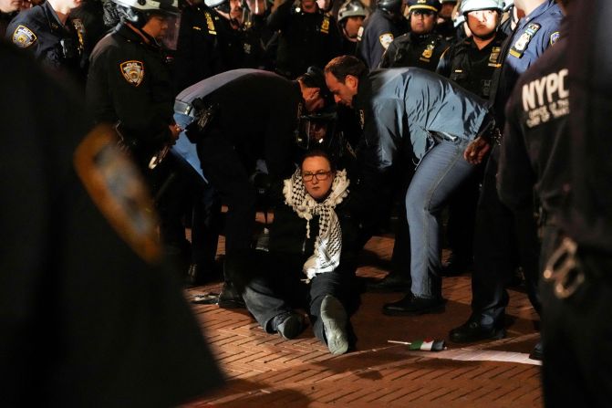 Police detain a protester at Columbia on April 30.