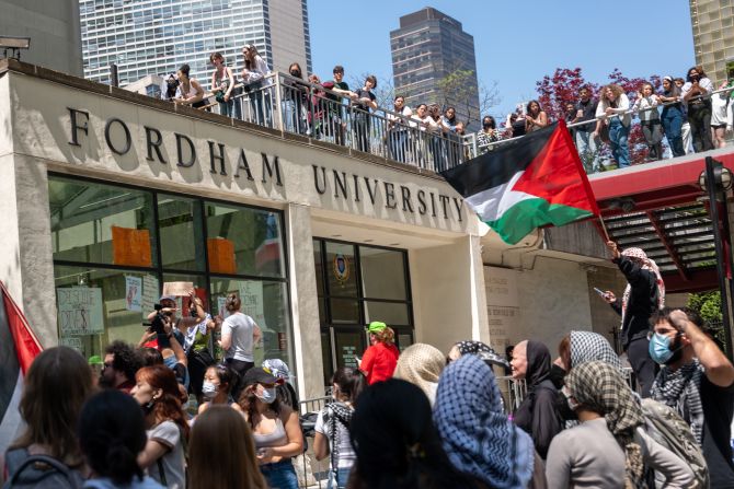 Pro-Palestinian protesters gather outside Fordham University's Lincoln Center campus after a group created an encampment inside the building in New York on May 1.