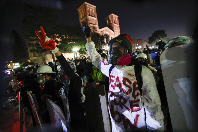 Pro-Palestinian protesters stand their ground after police breached their encampment at UCLA on May 2.