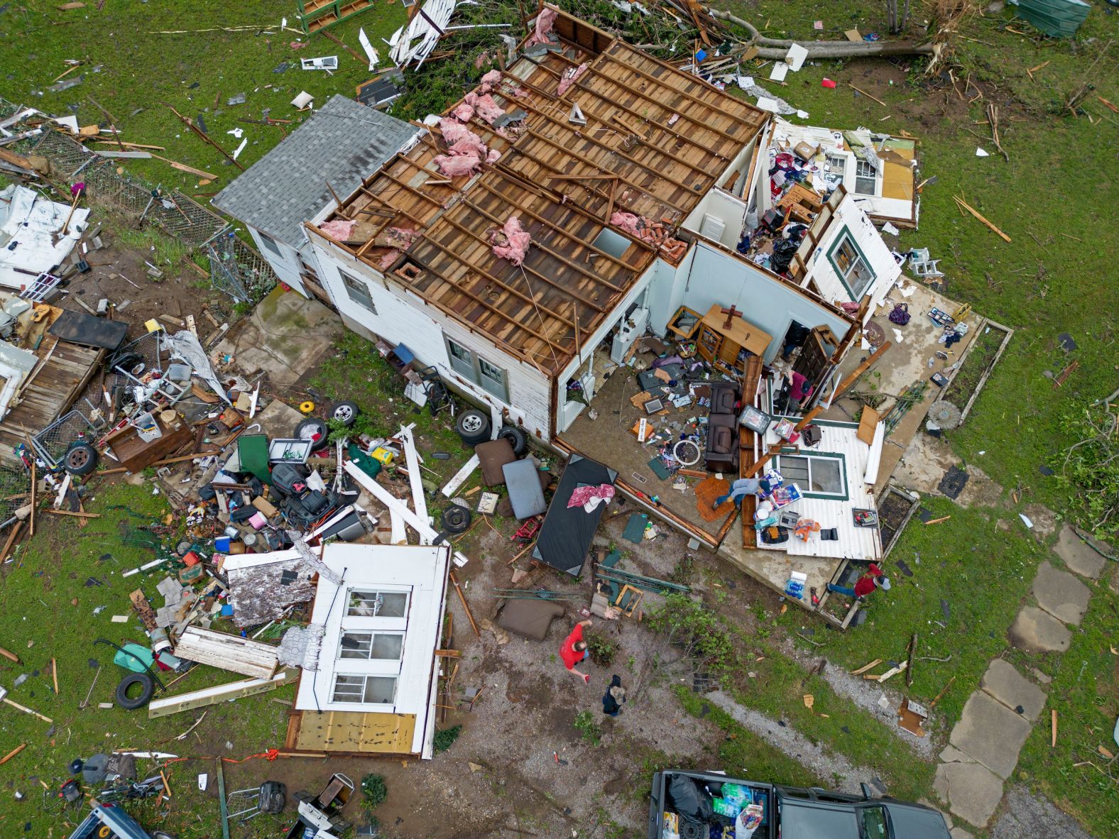 This home in Sulphur, Oklahoma, was heavily damaged by a tornado that hit on Saturday, April 27. At least four people were killed in Oklahoma after an <a href="index.php?page=&url=https%3A%2F%2Fwww.cnn.com%2F2024%2F04%2F28%2Fweather%2Fplains-midwest-storms-tornadoes-climate-sunday%2Findex.html" target="_blank">overnight tornado outbreak</a>.