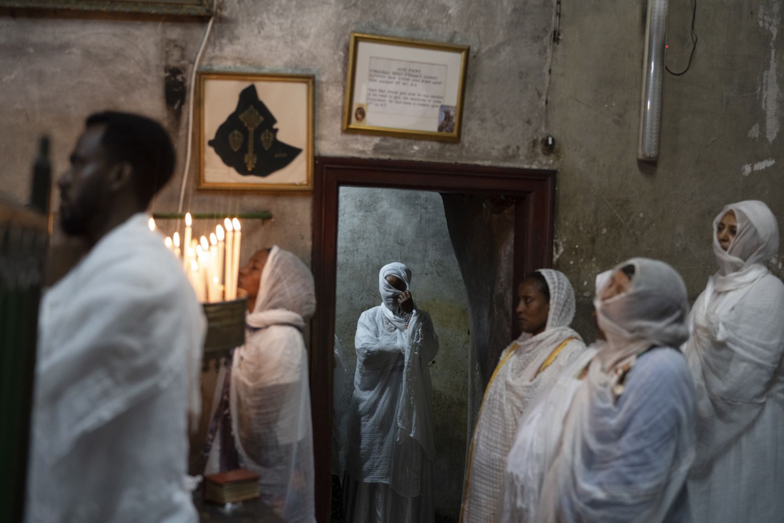 Ethiopian Orthodox Christian worshippers pray during the Washing of the Feet ceremony at the Ethiopian monks' village Deir Al-Sultan, which is on the rooftop of the Church of the Holy Sepulchre in Jerusalem's Old City, on Thursday, May 2.