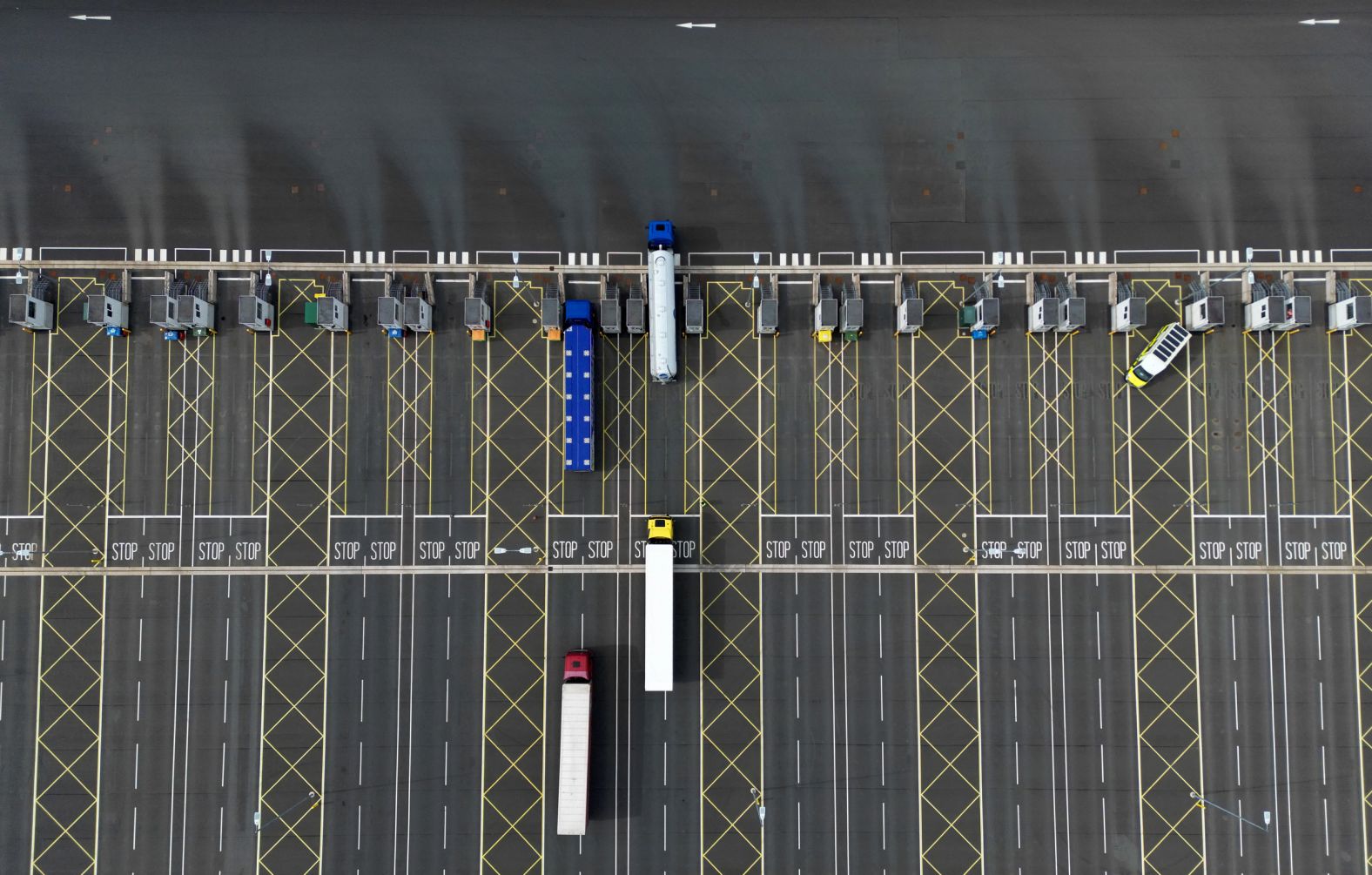 This aerial picture shows freight trucks and heavy goods vehicles parked at the Sevington Inland Border Facility, between the English villages of Sevington and Mersham, on Monday, April 29. Tuesday marked <a href="index.php?page=&url=https%3A%2F%2Fwww.cnn.com%2F2024%2F04%2F30%2Fbusiness%2Fbrexit-border-check-britain-prices%2Findex.html" target="_blank">the long-delayed start</a> of post-Brexit physical inspections of plant and animal imports from the European Union. The spot checks will apply initially to products such as meat, cheese and some fish, and eventually to a range of vegetables and fruit.