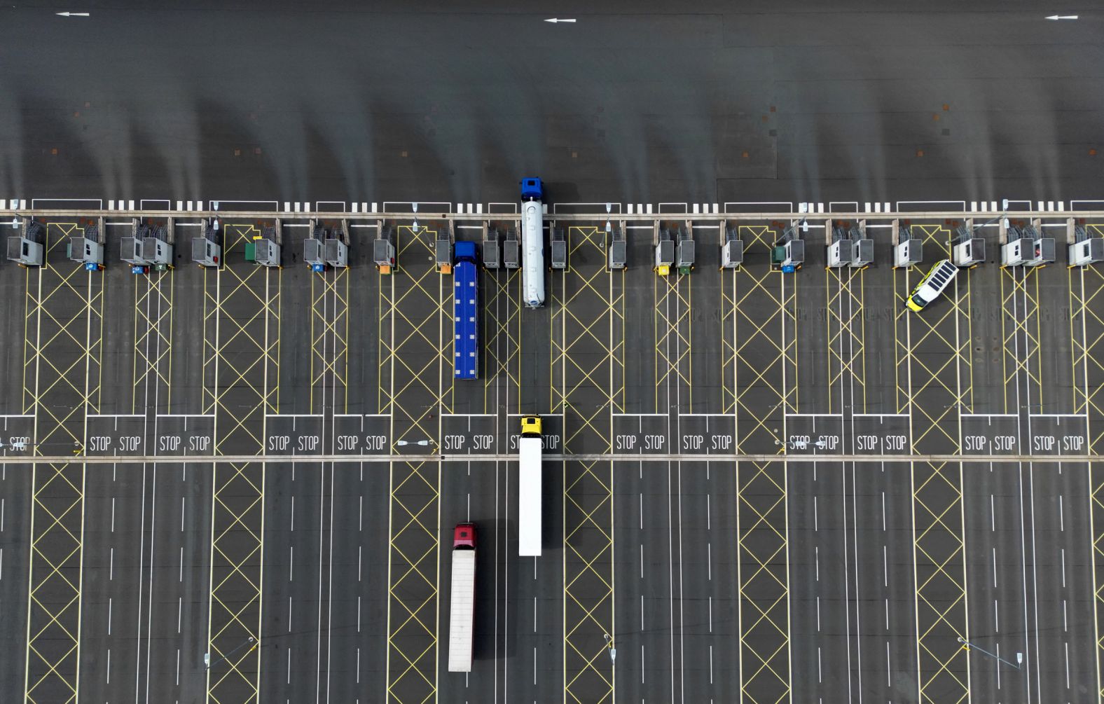 This aerial picture shows freight trucks and heavy goods vehicles parked at the Sevington Inland Border Facility, between the English villages of Sevington and Mersham, on Monday, April 29. Tuesday marked <a href="index.php?page=&url=https%3A%2F%2Fwww.cnn.com%2F2024%2F04%2F30%2Fbusiness%2Fbrexit-border-check-britain-prices%2Findex.html" target="_blank">the long-delayed start</a> of post-Brexit physical inspections of plant and animal imports from the European Union. The spot checks will apply initially to products such as meat, cheese and some fish, and eventually to a range of vegetables and fruit.