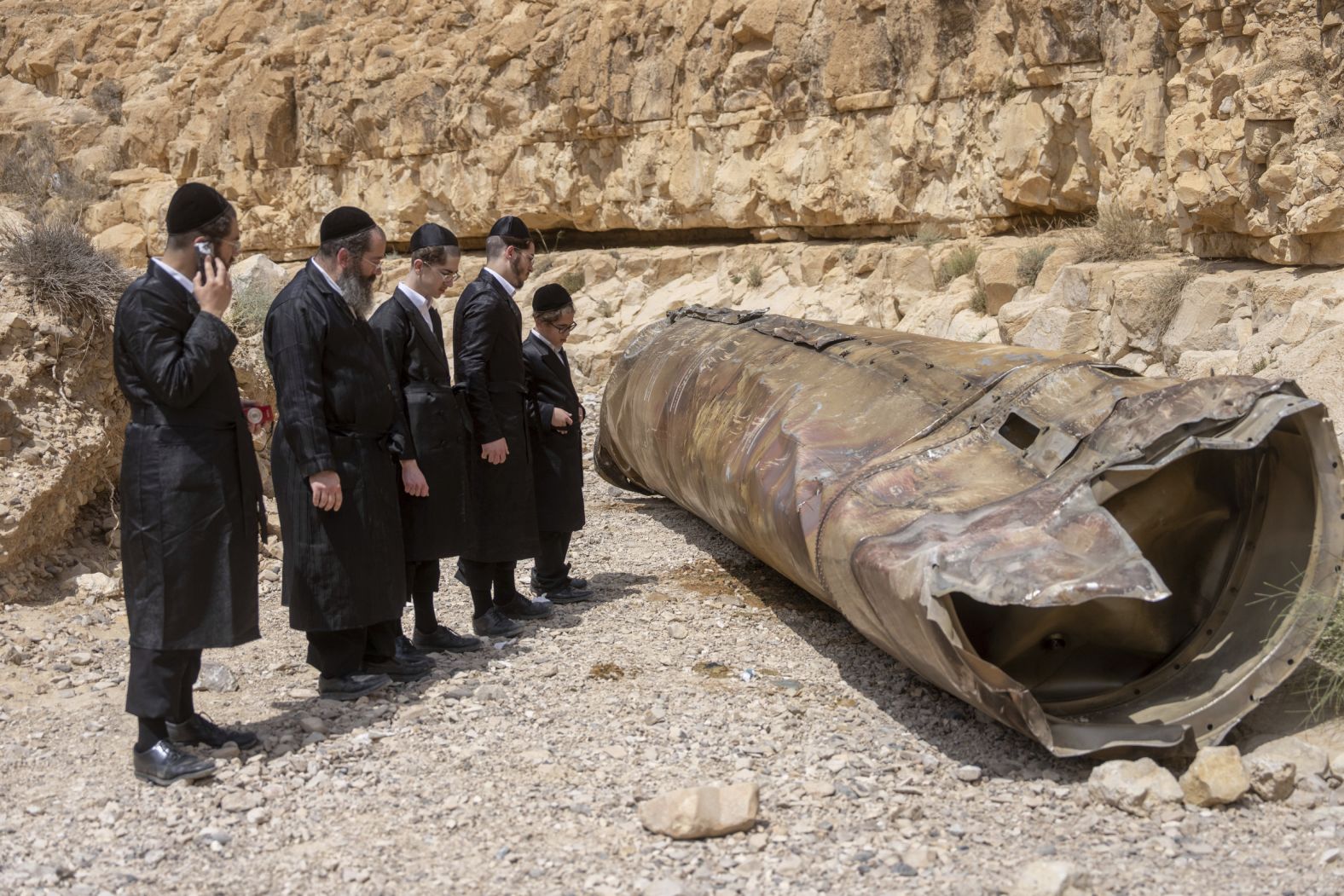 Ultra-Orthodox Jews observe part of an intercepted ballistic missile that fell in the desert near Arad, Israel, on Sunday, April 28. Nearly all the missiles and drones Iran launched at Israel in an <a href="index.php?page=&url=https%3A%2F%2Fwww.cnn.com%2F2024%2F04%2F14%2Fmiddleeast%2Fisrael-air-missile-defense-iran-attack-intl-hnk-ml%2Findex.html" target="_blank">unprecedented attack last month</a> were intercepted, according to Israeli and American officials. <a href="index.php?page=&url=https%3A%2F%2Fwww.cnn.com%2F2024%2F04%2F13%2Fmiddleeast%2Firan-drones-attack-israel-intl-latam%2Findex.html" target="_blank">The attack</a> followed an Israeli strike on an Iranian diplomatic complex in Syria.