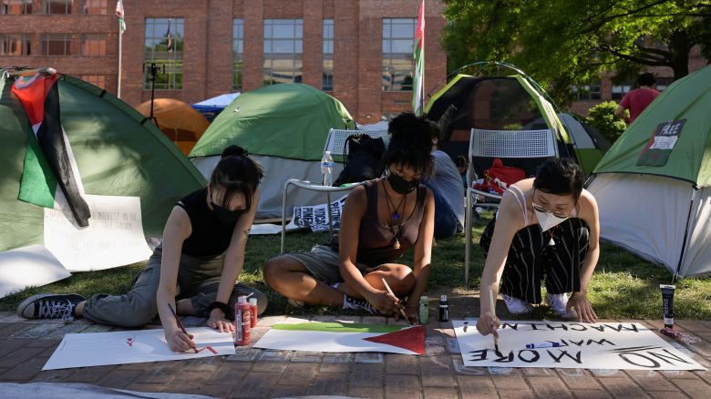 Activists make protest signs inside a pro-Palestinian encampment at George Washington University in Washington, DC, U.S., May 2, 2024. REUTERS/Craig Hudson