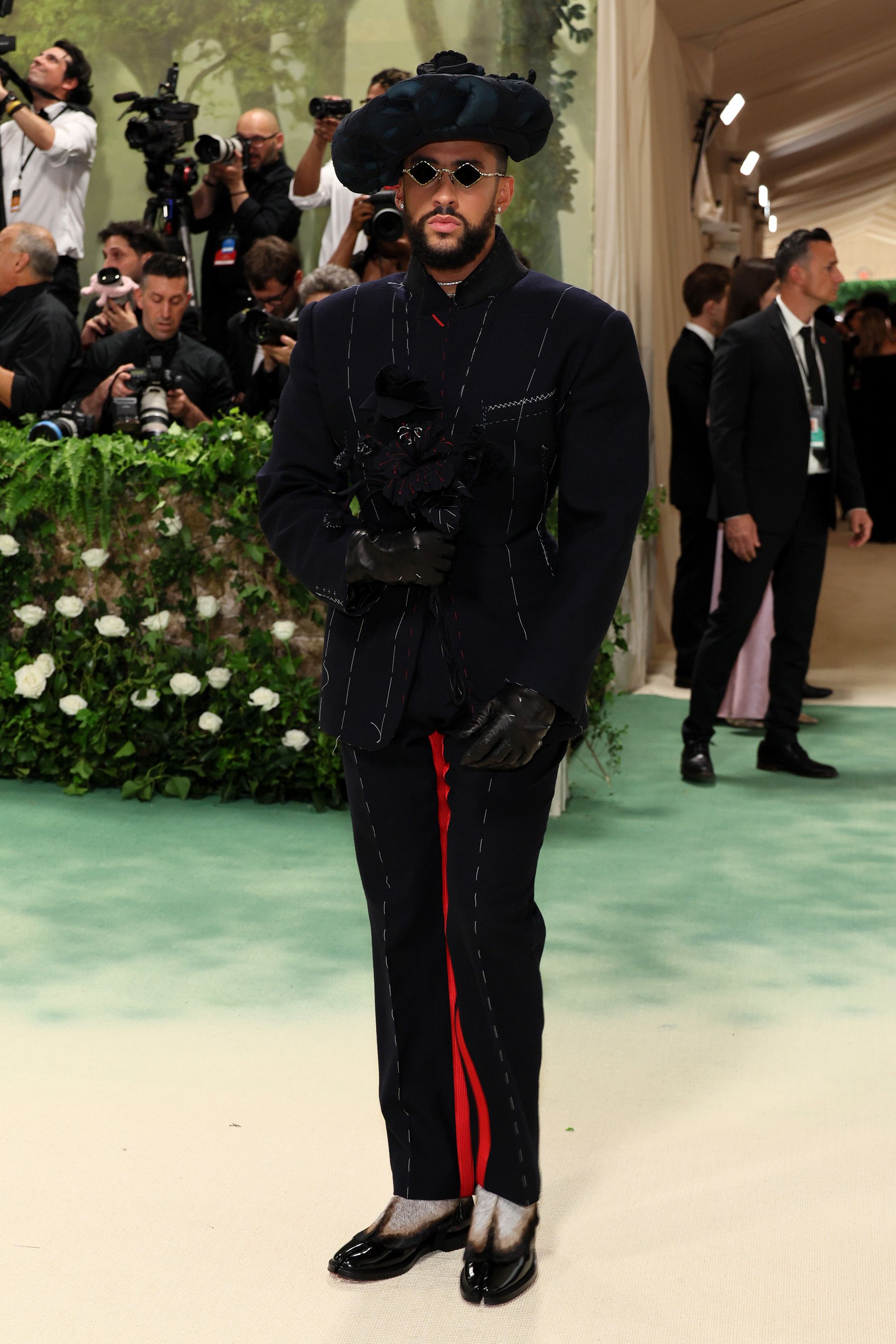 Met Gala co-chair Bad Bunny in a daring look from Maison Margiela by John Galliano. 