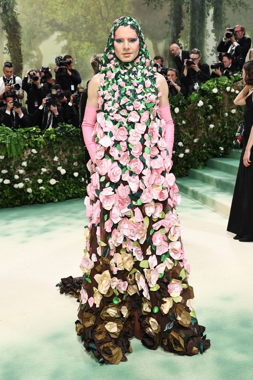 Jordan Roth was tucked away in a field of flowers in his custom Maison Valentino look. 