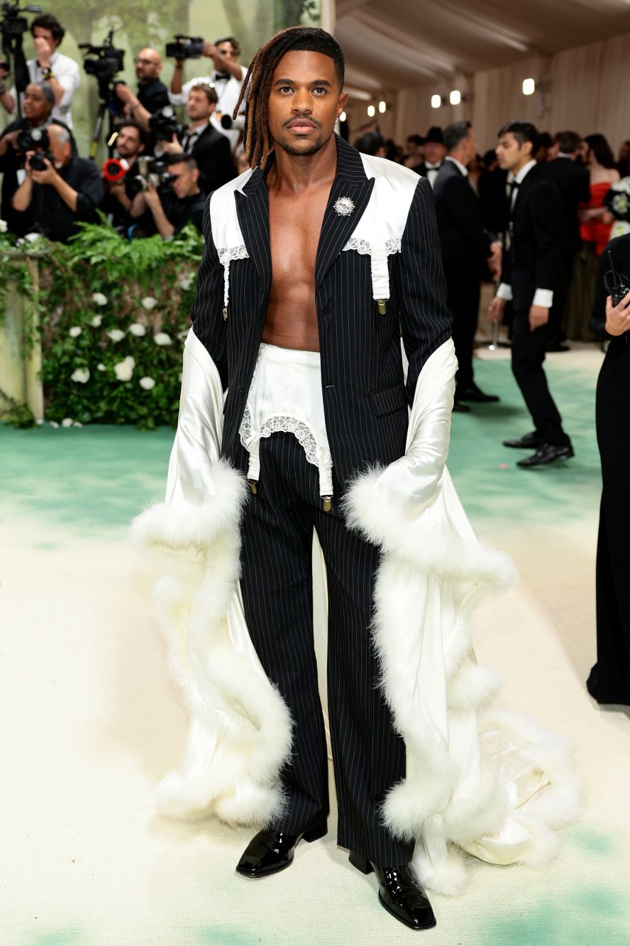 Jeremy Pope gave his suit a playful feminine twist with this Tanner Fletcher outfit that mixed in lace and fur trims.
