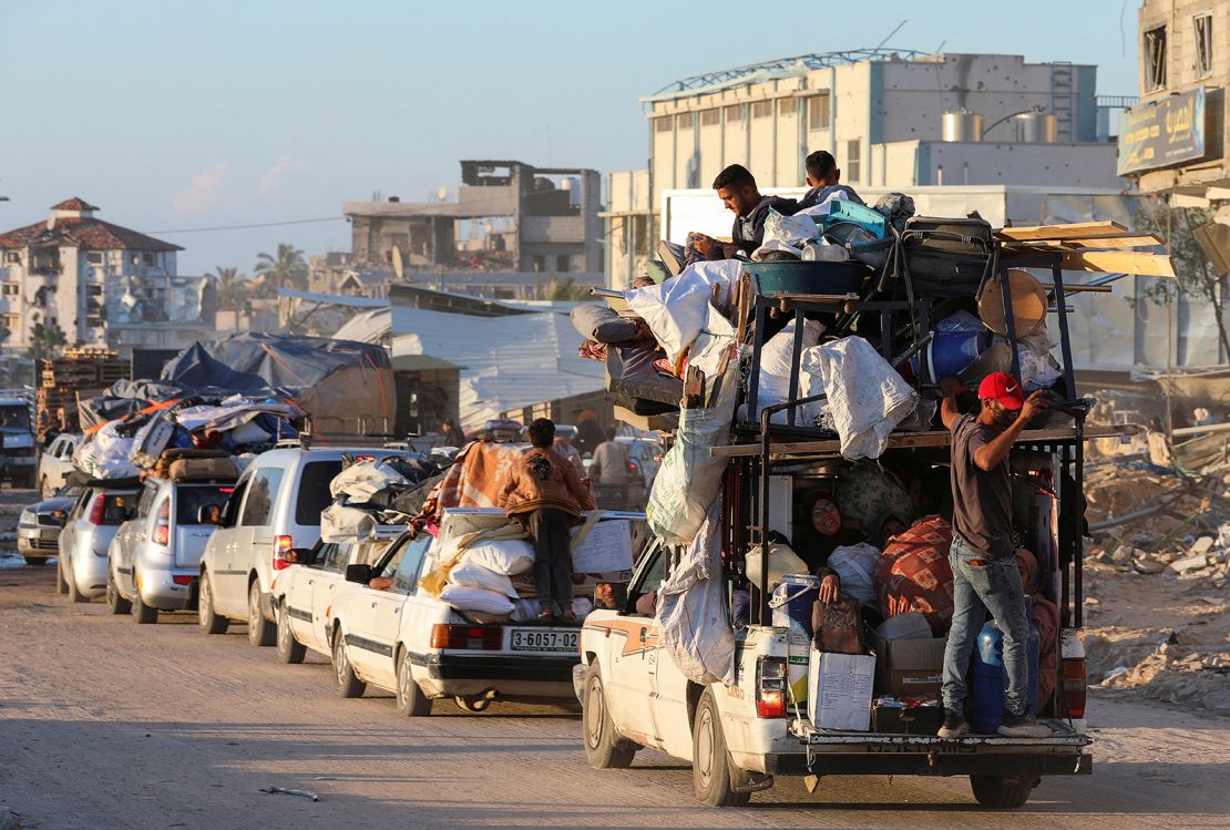 Displaced Palestinians, who fled Rafah after the Israeli military began evacuating civilians from the eastern parts of the southern Gazan city, ahead of a threatened assault, amid the ongoing conflict between Israel and Hamas, travel on a vehicle, in Khan Younis in the southern Gaza Strip May 6, 2024.