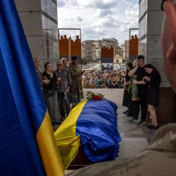 Relatives react during a commemoration ceremony for Ukrainian soldier Eduard Hatmullin in Independence Square in Kyiv, Ukraine, amid Russia's attack on Ukraine, May 6, 2024. REUTERS/Thomas Peter
