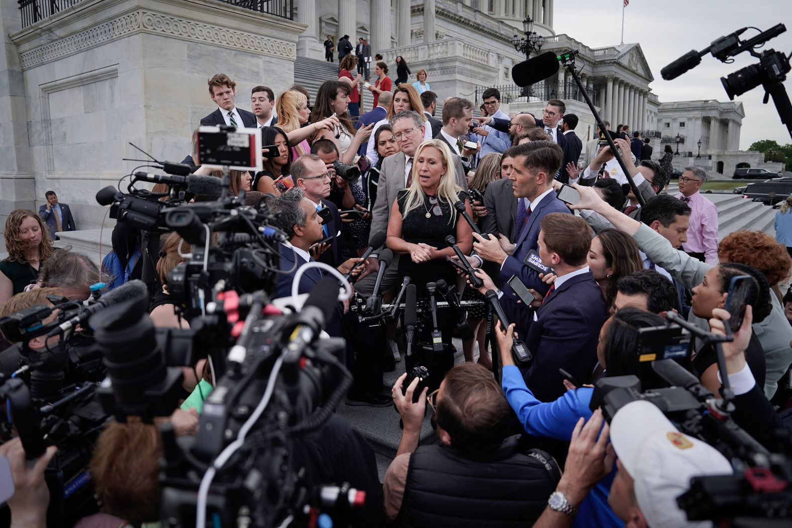 US Rep. Marjorie Taylor Greene speaks to members of the press outside the US Capitol on Wednesday, May 8, after she introduced a motion to remove Speaker Mike Johnson.<a href="index.php?page=&url=https%3A%2F%2Fwww.cnn.com%2F2024%2F05%2F08%2Fpolitics%2Fhouse-rejects-greene-motion-to-vacate%2Findex.html" target="_blank"> The House voted to table, or kill, the effort by a vote of 359-43</a>.