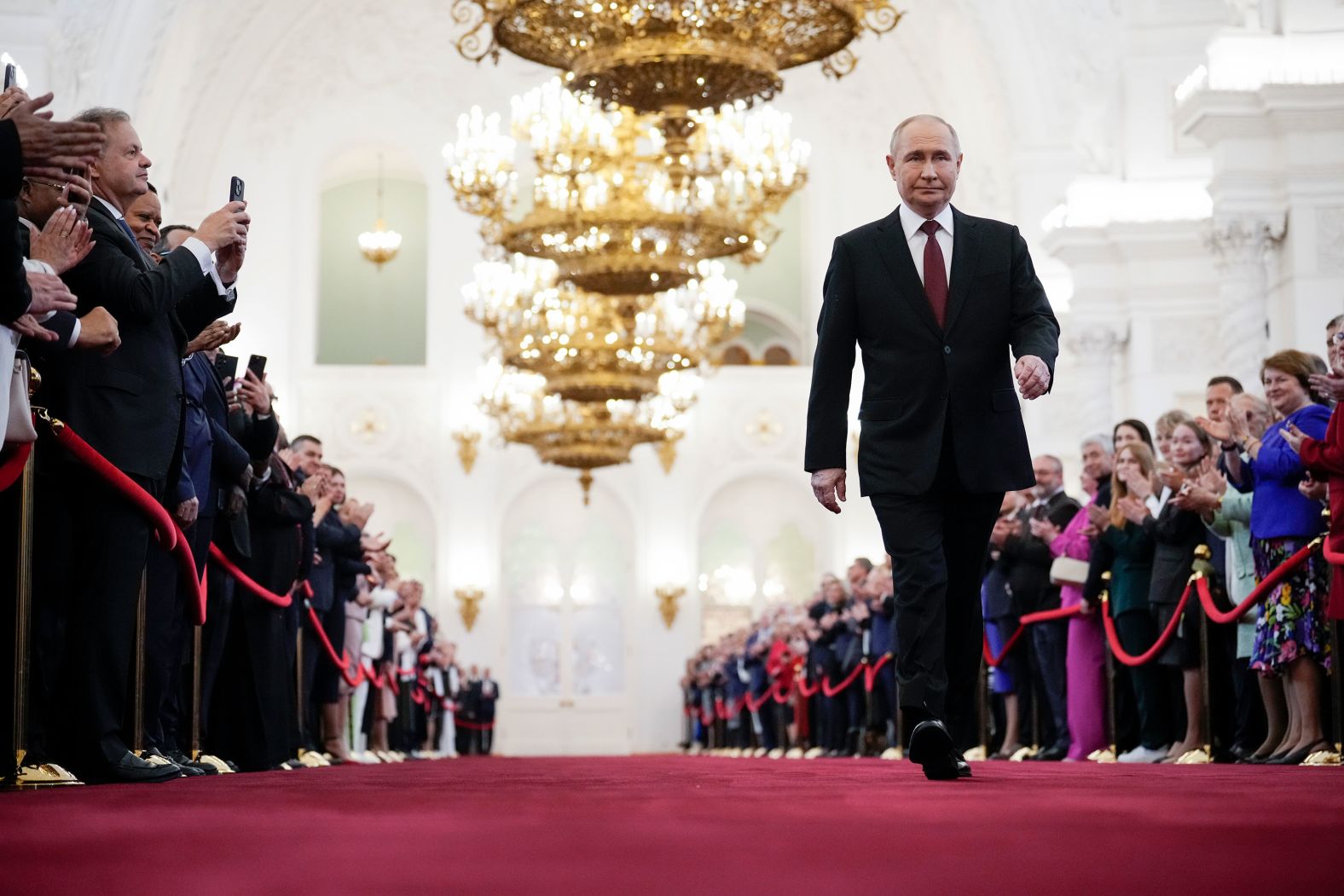 Vladimir Putin walks to take his oath as Russian president during an inauguration ceremony in Moscow on Tuesday, May 7. Putin won <a href="index.php?page=&url=https%3A%2F%2Fwww.cnn.com%2F2024%2F05%2F07%2Feurope%2Fputin-inauguration-russia-president-fifth-term-intl" target="_blank">Russia's stage-managed election</a> by an overwhelming majority in March, securing for himself another six-year term that could see him rule until at least his 77th birthday.