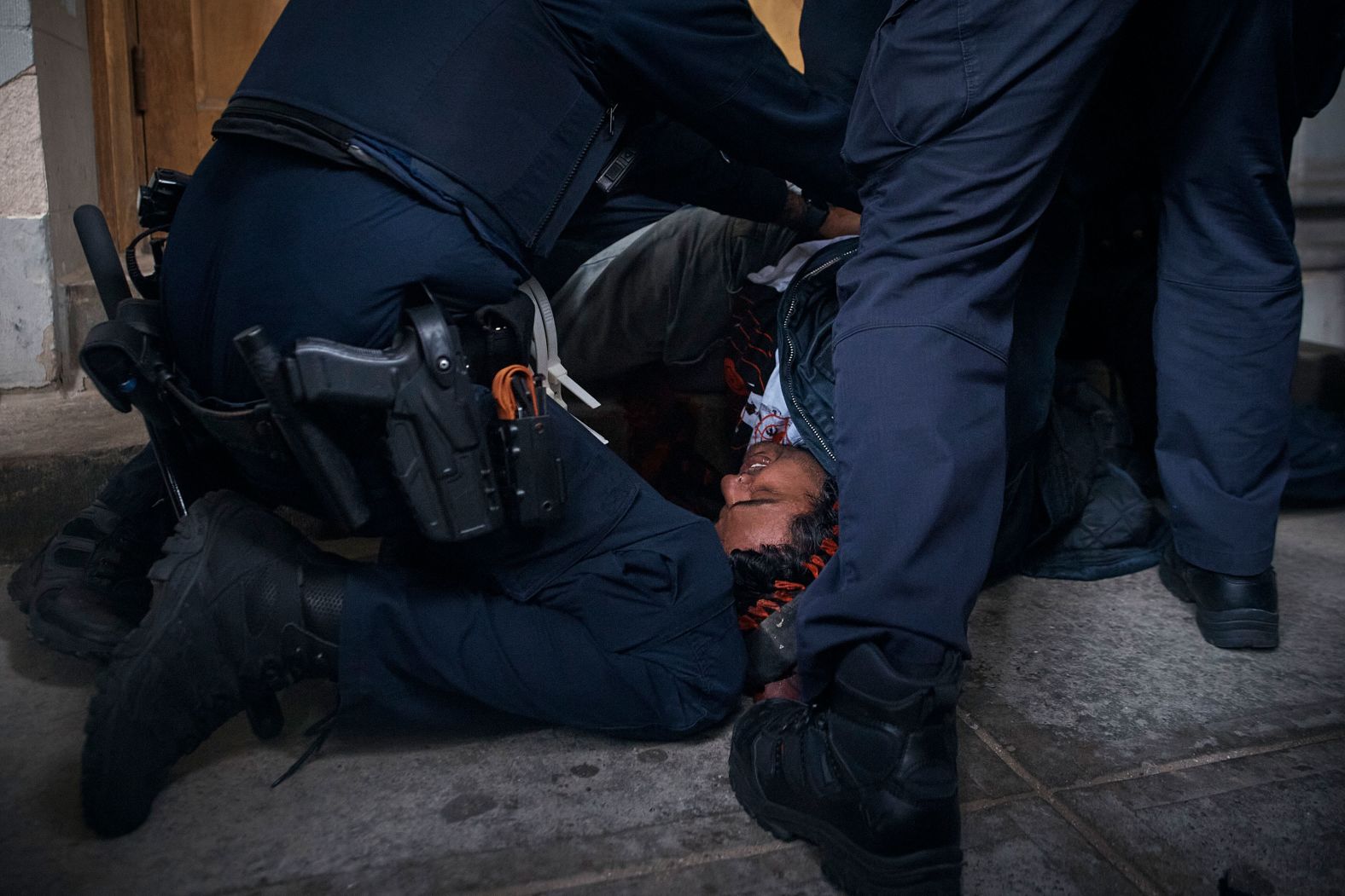 Police detain a protester near the Metropolitan Museum of Art in New York, where the Met Gala was taking place on Monday, May 6.